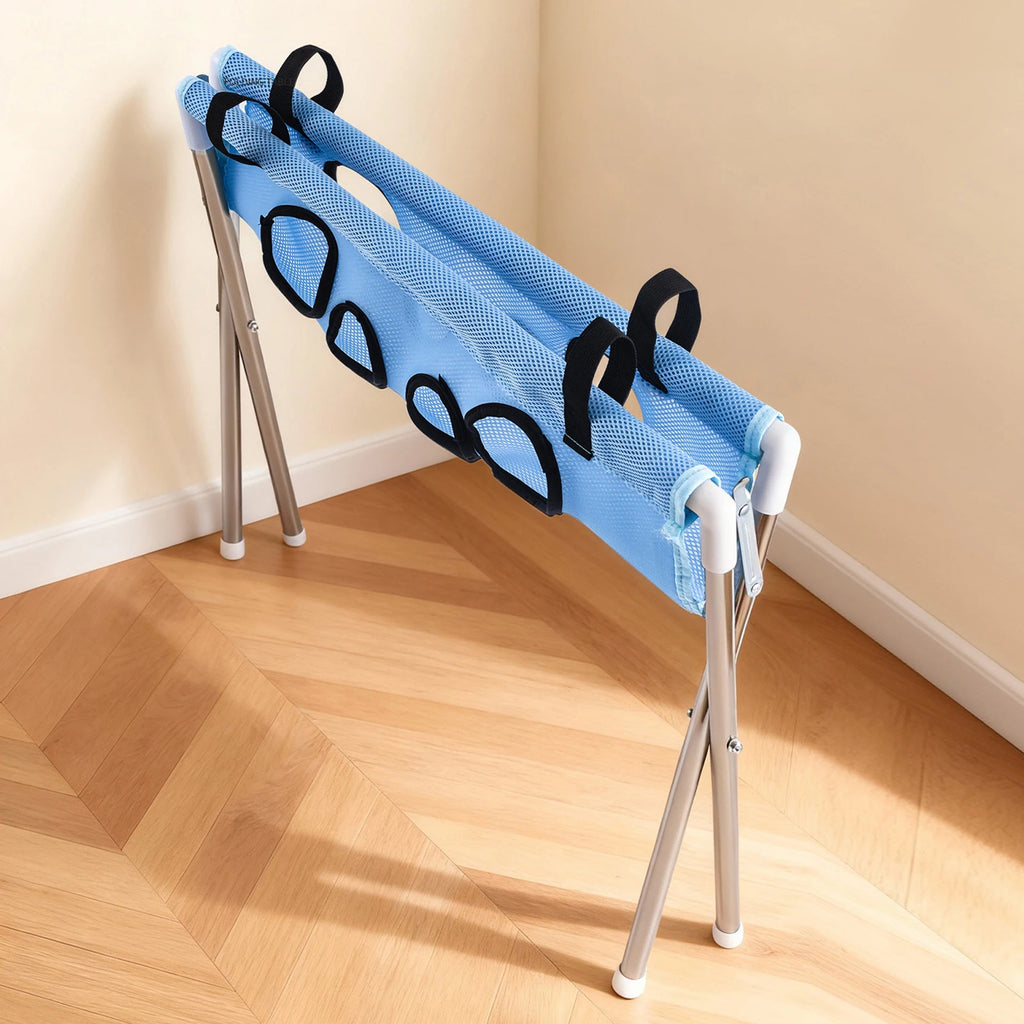 Pawperch stand folded flat and leaning against a wall